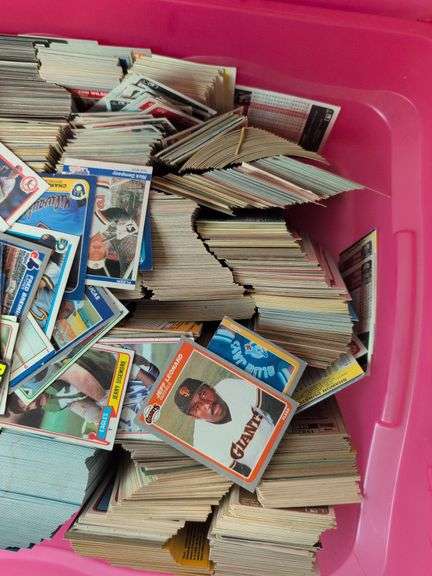 Tote full of 80s and 90s baseball, football, and basketball cards