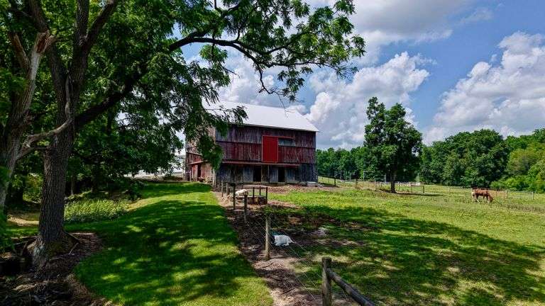 Parcel 1: 9.4 Acres with Farmstead, Pond and Cabin.