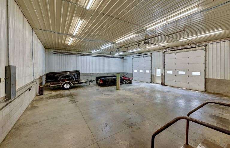 Parcel 1: 9.4 Acres with Farmstead, Pond and Cabin.