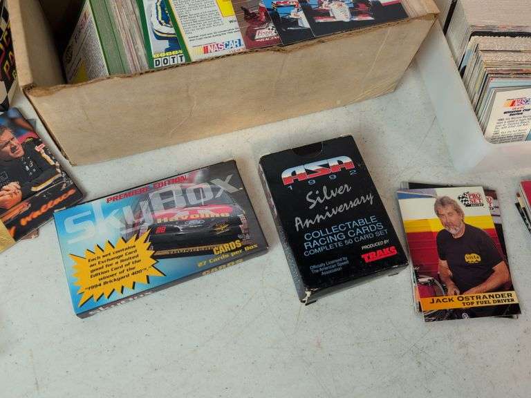 Assortment of racing cards and framed picture