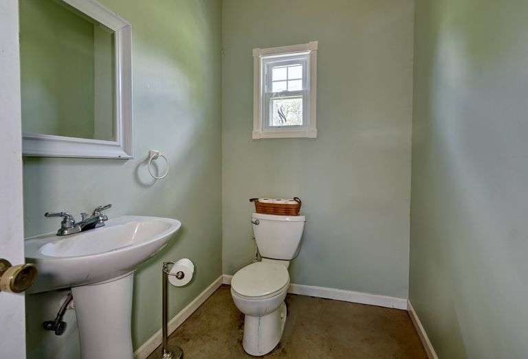 Parcel 1: 9.4 Acres with Farmstead, Pond and Cabin.