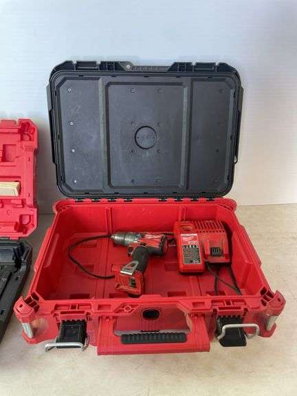 Milwaukee pack out and tool box with drill, impact, battery and charger