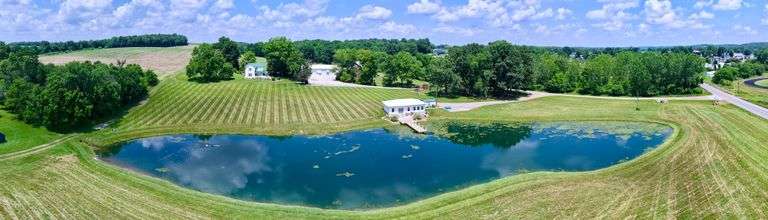 Parcel 1: 9.4 Acres with Farmstead, Pond and Cabin.
