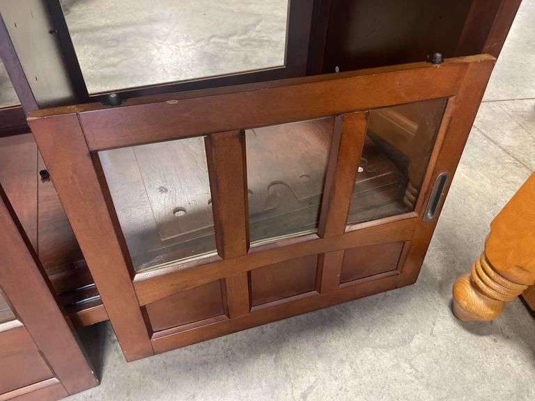 Wooden TV stand with glass doors