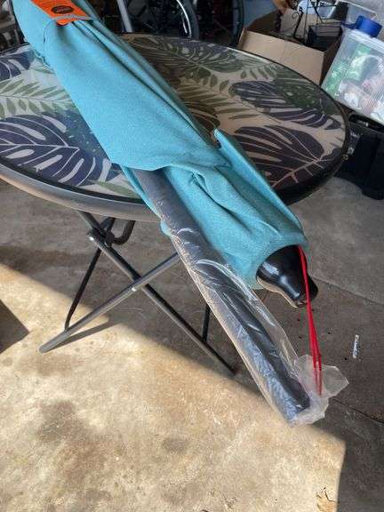 OUTDOOR GLASS TOP TABLE AND UMBRELLA