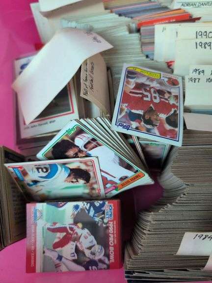 Tote full of 80s and 90s baseball, football, and basketball cards