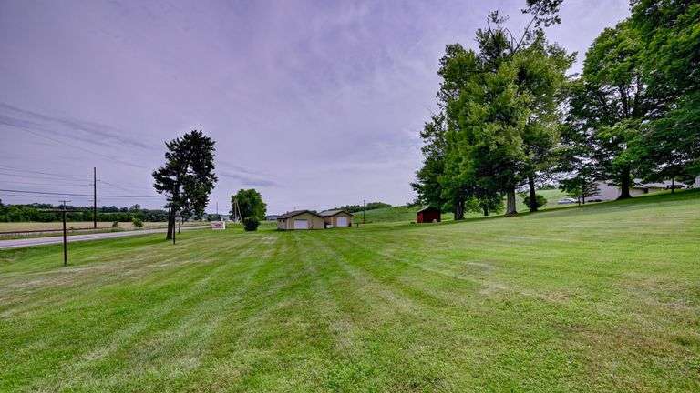 Absolute Home & Outbuildings on 3.75 Acres