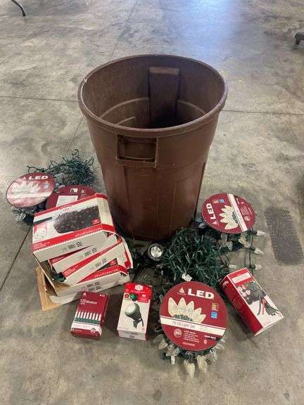 Trash barrel with large amount of Christmas lights