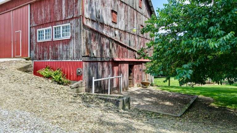 Parcel 1: 9.4 Acres with Farmstead, Pond and Cabin.