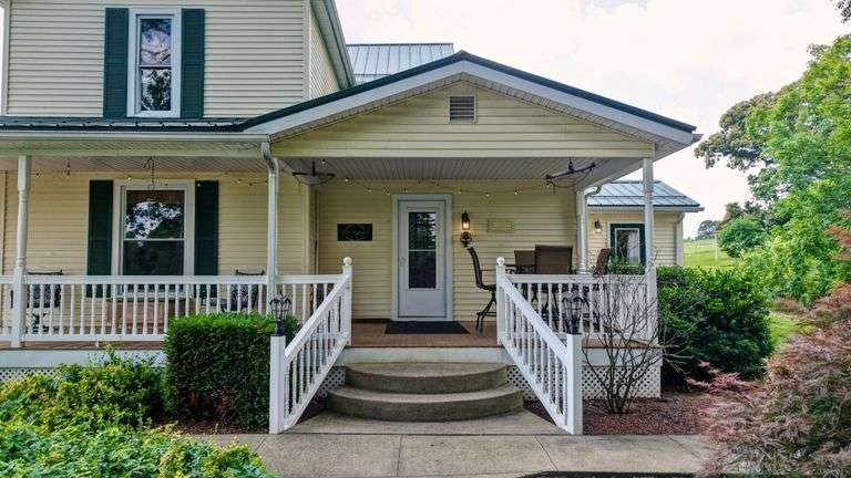 Parcel 1: 9.4 Acres with Farmstead, Pond and Cabin.