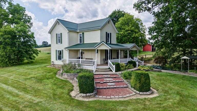 Parcel 1: 9.4 Acres with Farmstead, Pond and Cabin.