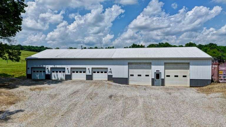 Parcel 1: 9.4 Acres with Farmstead, Pond and Cabin.