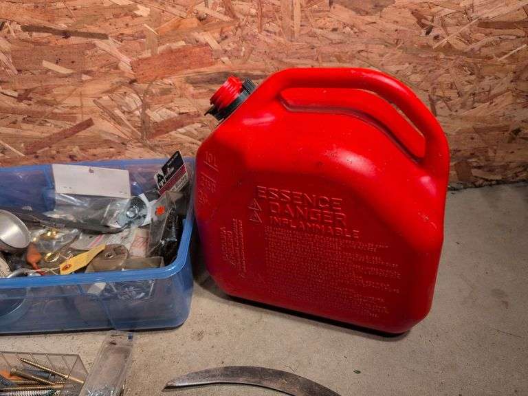 Miscellaneous tools and hardware - gas can, clamps, scythe, railroad nails, hacksaw blades, and more