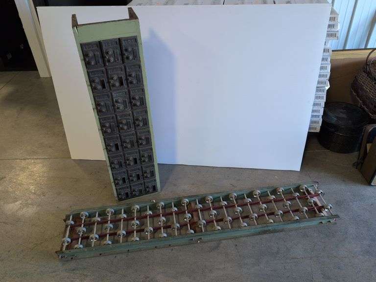 Vintage post office boxes and antique conveyor rollers