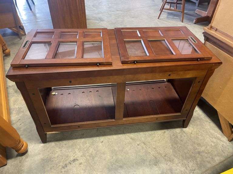 Wooden TV stand with glass doors