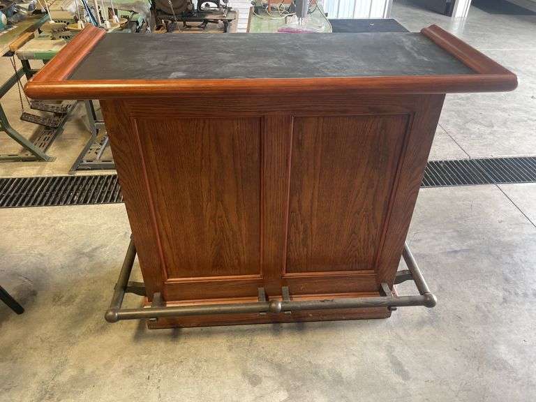 Free standing wooden bar with metal foot stools