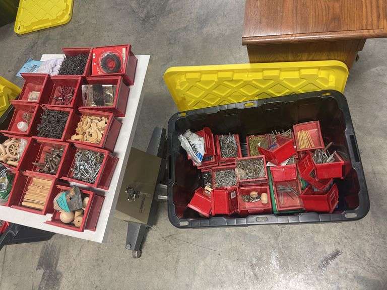 Tote of screws, woodworking supplies, and hardware