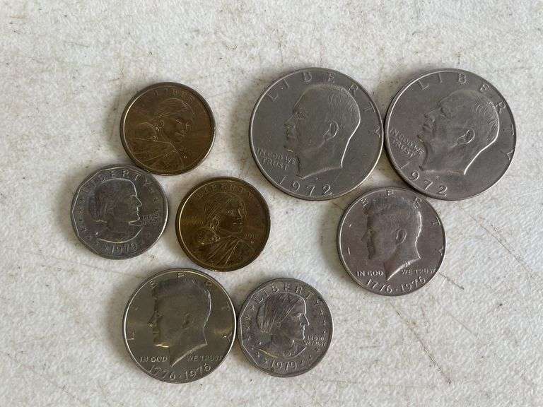 (2) Eisenhower dollar coins, (2) Kennedy half dollars, (2) Susan B. Anthony dollar coins, and (2) Sa