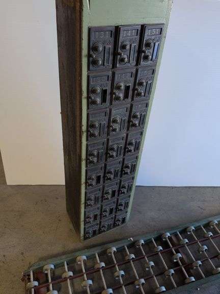 Vintage post office boxes and antique conveyor rollers