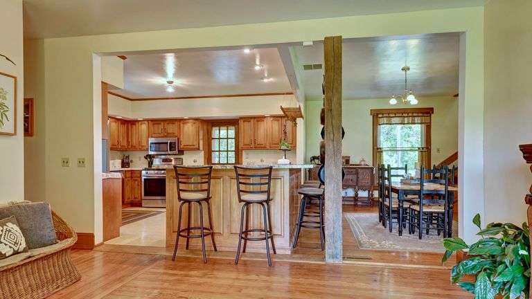 Parcel 1: 9.4 Acres with Farmstead, Pond and Cabin.