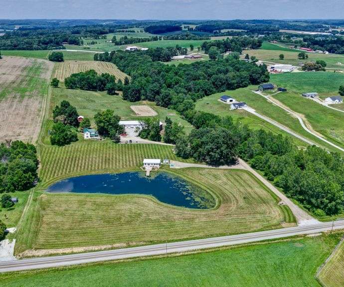 Parcel 1: 9.4 Acres with Farmstead, Pond and Cabin.