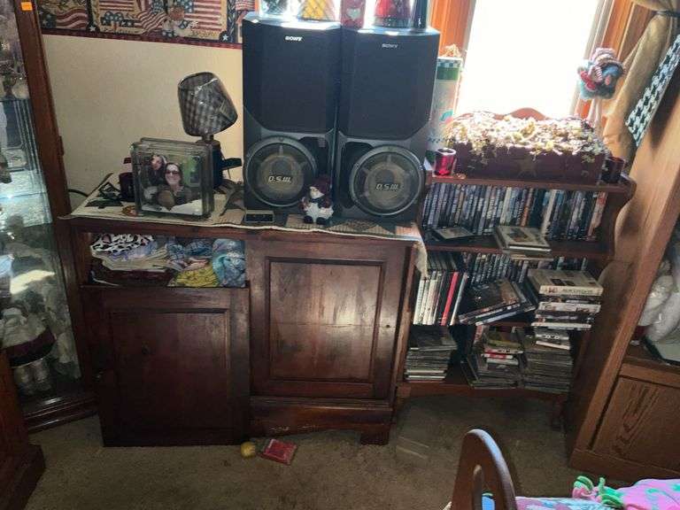 WOOD CABINET W/SPEAKERS AND SHELF OF DVD'S/CD'S