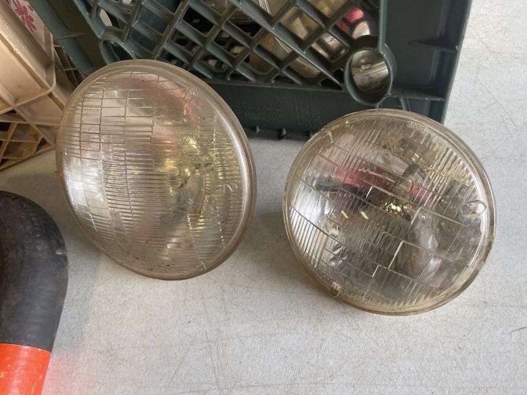 Vintage headlights and exhaust manifolds and pipes