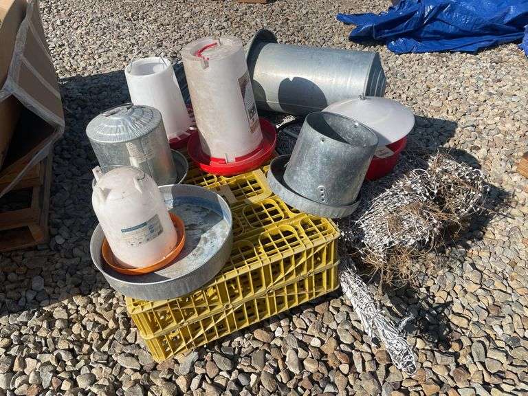 Large lot of poultry feeders & waterers, heat lamps, fencing, and misc.
