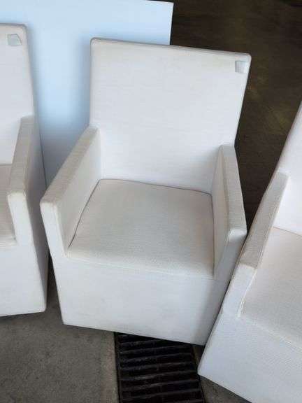 (4) matching white chairs on wheels