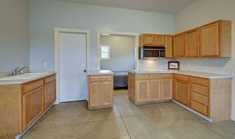 Parcel 1: 9.4 Acres with Farmstead, Pond and Cabin.