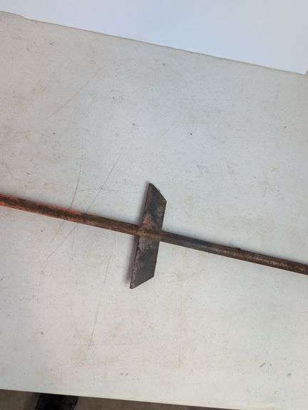 Large cast iron decorative piece and t-handled tool
