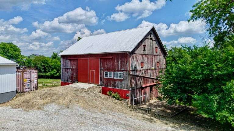 Parcel 1: 9.4 Acres with Farmstead, Pond and Cabin.