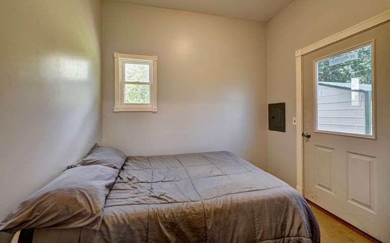 Parcel 1: 9.4 Acres with Farmstead, Pond and Cabin.
