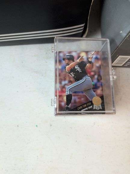 Football, baseball, and basketball trading cards with extra binder sleeves