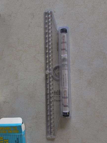 Dymo label maker kit, rolling ruler, and ceramic disc brake pads
