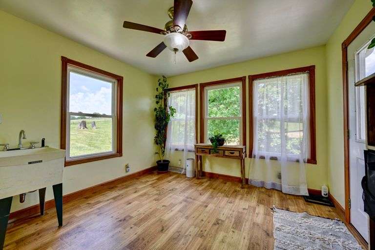 Parcel 1: 9.4 Acres with Farmstead, Pond and Cabin.