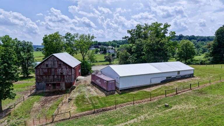 Parcel 1: 9.4 Acres with Farmstead, Pond and Cabin.