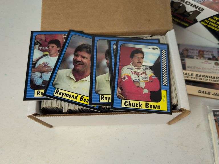 Assortment of racing cards and framed picture