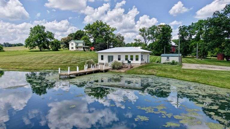 Parcel 1: 9.4 Acres with Farmstead, Pond and Cabin.