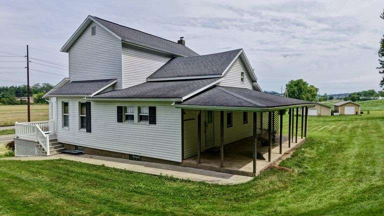 Absolute Home & Outbuildings on 3.75 Acres