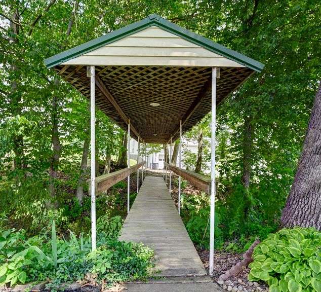 Parcel 1: 9.4 Acres with Farmstead, Pond and Cabin.