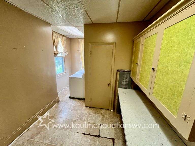 Fairmont 4 Bedroom Home with 4 Bay Garage