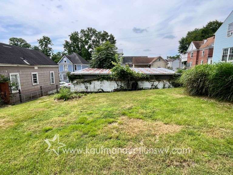Fairmont 4 Bedroom Home with 4 Bay Garage