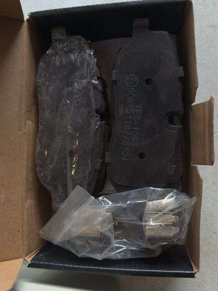 Dymo label maker kit, rolling ruler, and ceramic disc brake pads