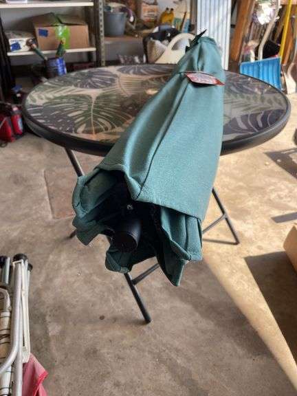 OUTDOOR GLASS TOP TABLE AND UMBRELLA