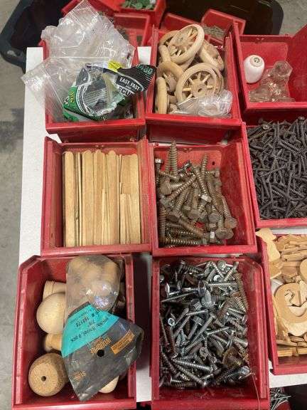 Tote of screws, woodworking supplies, and hardware