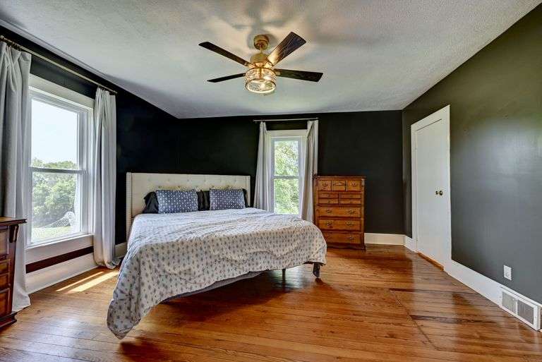 Parcel 1: 9.4 Acres with Farmstead, Pond and Cabin.