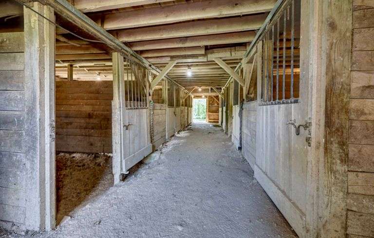 Parcel 1: 9.4 Acres with Farmstead, Pond and Cabin.