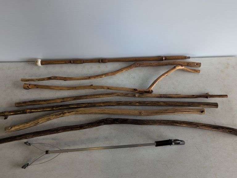 (7) unique walking sticks and grabber