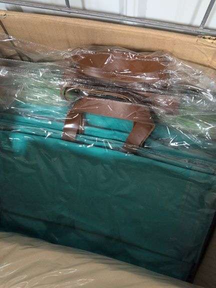 Box of brand new purses